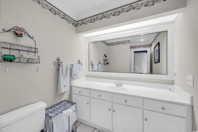 Discover classic lowcountry living in this elegant all-brick on Heritage Club in South Carolina - for sale on GolfHomes.com, golf home, golf lot