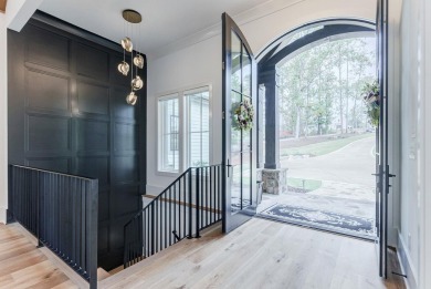 Discover unparalleled luxury and elegance in this brand-new on Reynolds Lake Oconee - The Oconee in Georgia - for sale on GolfHomes.com, golf home, golf lot