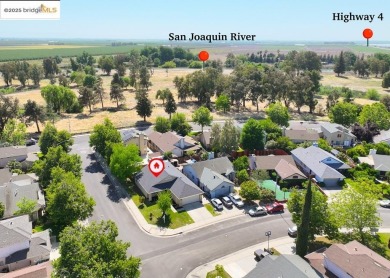 Welcome to this beautifully updated 4-bedroom, 2-bath home on Van Buskirk Municipal Golf Course in California - for sale on GolfHomes.com, golf home, golf lot