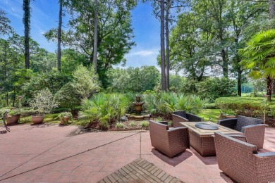 Discover classic lowcountry living in this elegant all-brick on Heritage Club in South Carolina - for sale on GolfHomes.com, golf home, golf lot