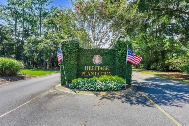Discover classic lowcountry living in this elegant all-brick on Heritage Club in South Carolina - for sale on GolfHomes.com, golf home, golf lot