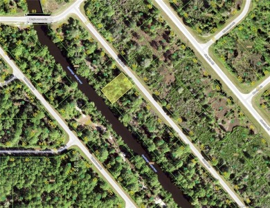 This waterfront lot is located in Port Charlotte is on Florida's on Riverwood Golf Club in Florida - for sale on GolfHomes.com, golf home, golf lot