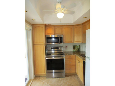 Welcome to this beautifully furnished upgraded 2-bedroom on Palm-Aire Country Club and Resort - Palms in Florida - for sale on GolfHomes.com, golf home, golf lot