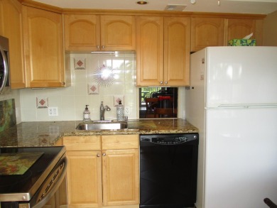 Welcome to this beautifully furnished upgraded 2-bedroom on Palm-Aire Country Club and Resort - Palms in Florida - for sale on GolfHomes.com, golf home, golf lot