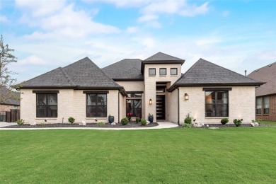 Welcome to this stunning custom-built single-story home on The Golf Club at Resort Eagle Mountain Lake in Texas - for sale on GolfHomes.com, golf home, golf lot