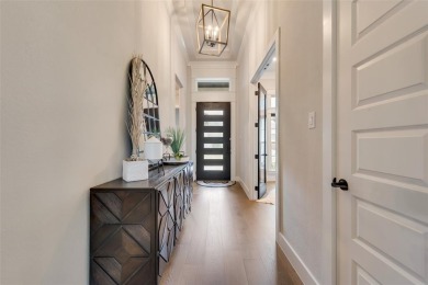 Welcome to this stunning custom-built single-story home on The Golf Club at Resort Eagle Mountain Lake in Texas - for sale on GolfHomes.com, golf home, golf lot
