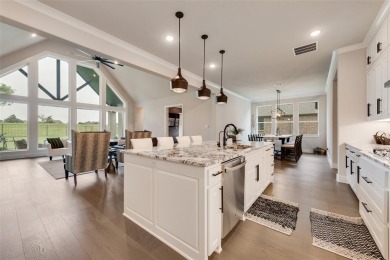 Welcome to this stunning custom-built single-story home on The Golf Club at Resort Eagle Mountain Lake in Texas - for sale on GolfHomes.com, golf home, golf lot