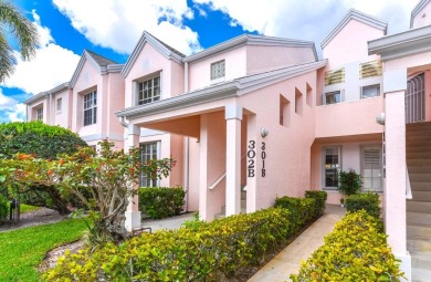 Step into this ground-level condo, where a warm embrace awaits on The Golf Club of Jupiter in Florida - for sale on GolfHomes.com, golf home, golf lot
