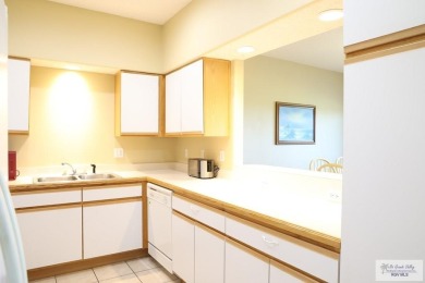 Enjoy panoramic views of the lake and golf course from this on South Padre Island Golf Club in Texas - for sale on GolfHomes.com, golf home, golf lot