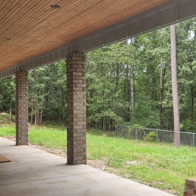 Introducing this impressive newly constructed residence on Diamondhead Golf and Country Club in Arkansas - for sale on GolfHomes.com, golf home, golf lot