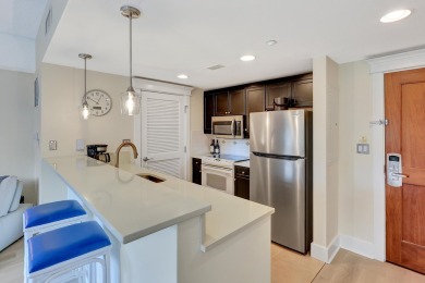 From this third floor covered balcony, enjoy beautiful views of on Sandestin Golf and Beach Resort - Raven in Florida - for sale on GolfHomes.com, golf home, golf lot