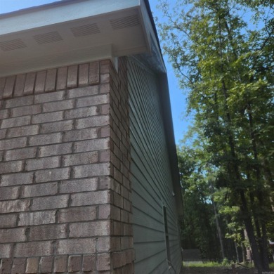 Introducing this impressive newly constructed residence on Diamondhead Golf and Country Club in Arkansas - for sale on GolfHomes.com, golf home, golf lot