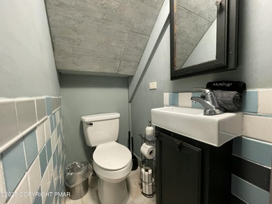 Welcome to your new mountain retreat! This beautiful 3-bedroom on Pocono Farms Country Club in Pennsylvania - for sale on GolfHomes.com, golf home, golf lot