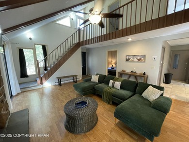 Welcome to your new mountain retreat! This beautiful 3-bedroom on Pocono Farms Country Club in Pennsylvania - for sale on GolfHomes.com, golf home, golf lot