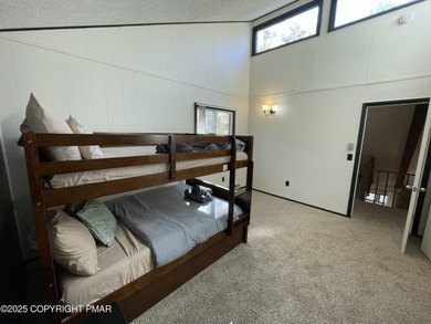 Welcome to your new mountain retreat! This beautiful 3-bedroom on Pocono Farms Country Club in Pennsylvania - for sale on GolfHomes.com, golf home, golf lot