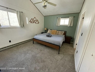 Welcome to your new mountain retreat! This beautiful 3-bedroom on Pocono Farms Country Club in Pennsylvania - for sale on GolfHomes.com, golf home, golf lot