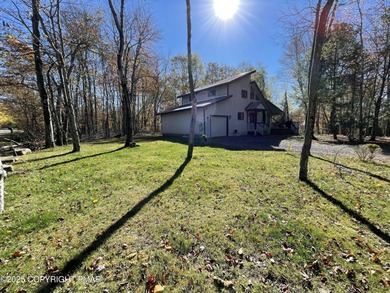 Welcome to your new mountain retreat! This beautiful 3-bedroom on Pocono Farms Country Club in Pennsylvania - for sale on GolfHomes.com, golf home, golf lot