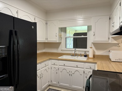 Nestled on over half an acre in a quiet cul-de-sac. this on Forest Heights Country Club in Georgia - for sale on GolfHomes.com, golf home, golf lot