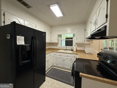 Nestled on over half an acre in a quiet cul-de-sac. this on Forest Heights Country Club in Georgia - for sale on GolfHomes.com, golf home, golf lot