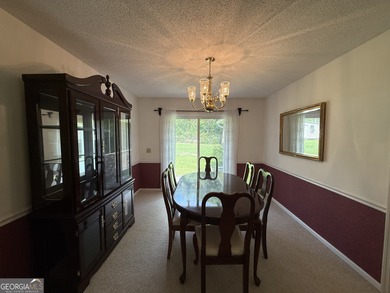 Nestled on over half an acre in a quiet cul-de-sac. this on Forest Heights Country Club in Georgia - for sale on GolfHomes.com, golf home, golf lot