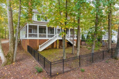 Charming lake access home situated on a unique lot that offers on Reynolds Lake Oconee - The Oconee in Georgia - for sale on GolfHomes.com, golf home, golf lot