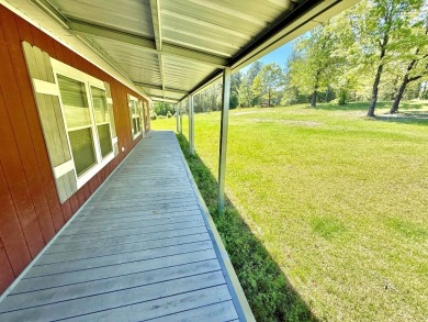 Lakeside Retreat: Spacious Home on 3.9 Acres Near Lake Sam on Rayburn Country Club in Texas - for sale on GolfHomes.com, golf home, golf lot