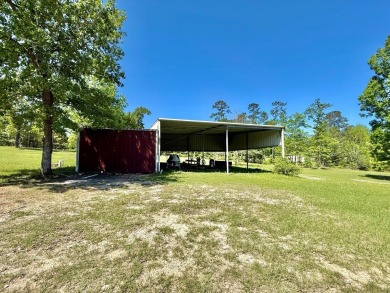 Lakeside Retreat: Spacious Home on 3.9 Acres Near Lake Sam on Rayburn Country Club in Texas - for sale on GolfHomes.com, golf home, golf lot