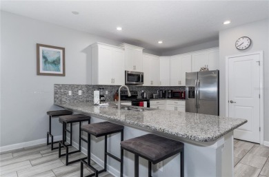 Your Ultimate Vacation Home and Investment Opportunity in on The Oasis Club at Champions Gate in Florida - for sale on GolfHomes.com, golf home, golf lot