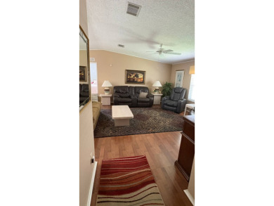 This move-in-ready gem has 2 bedrooms, 2 baths, and is located on Sabal Springs Golf and Racquet Club in Florida - for sale on GolfHomes.com, golf home, golf lot