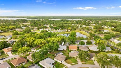 One or more photo(s) has been virtually staged. Nestled in on Highland Lakes Executive Golf Course in Florida - for sale on GolfHomes.com, golf home, golf lot