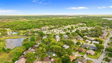 One or more photo(s) has been virtually staged. Nestled in on Highland Lakes Executive Golf Course in Florida - for sale on GolfHomes.com, golf home, golf lot
