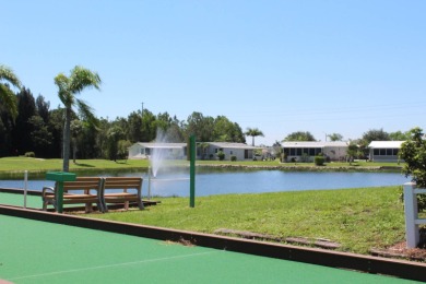 This move-in-ready gem has 2 bedrooms, 2 baths, and is located on Sabal Springs Golf and Racquet Club in Florida - for sale on GolfHomes.com, golf home, golf lot