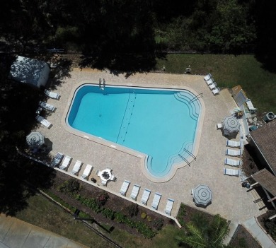 One or more photo(s) has been virtually staged. Nestled in on Highland Lakes Executive Golf Course in Florida - for sale on GolfHomes.com, golf home, golf lot