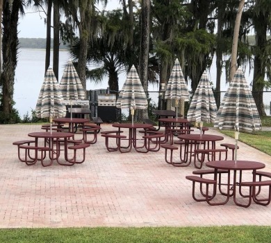 One or more photo(s) has been virtually staged. Nestled in on Highland Lakes Executive Golf Course in Florida - for sale on GolfHomes.com, golf home, golf lot