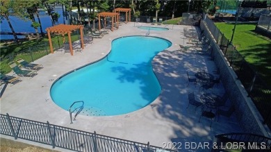 Four Seasons Building Lot that is fairly level and wooded on Seasons Ridge At Four Seasons in Missouri - for sale on GolfHomes.com, golf home, golf lot