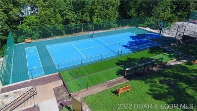 Four Seasons Building Lot that is fairly level and wooded on Seasons Ridge At Four Seasons in Missouri - for sale on GolfHomes.com, golf home, golf lot