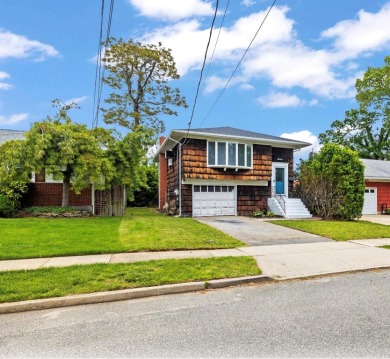 Welcome to this stunning, renovated Hi-Ranch in the heart of on Peninsula Golf Club in New York - for sale on GolfHomes.com, golf home, golf lot