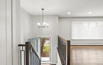 Welcome to this stunning, renovated Hi-Ranch in the heart of on Peninsula Golf Club in New York - for sale on GolfHomes.com, golf home, golf lot
