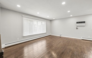 Welcome to this stunning, renovated Hi-Ranch in the heart of on Peninsula Golf Club in New York - for sale on GolfHomes.com, golf home, golf lot