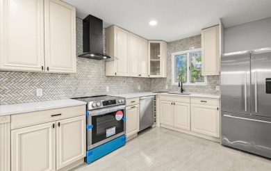 Welcome to this stunning, renovated Hi-Ranch in the heart of on Peninsula Golf Club in New York - for sale on GolfHomes.com, golf home, golf lot
