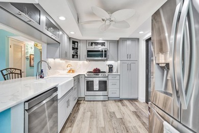 Step within 54 Piedmont B, a quaint coastal retreat, truly set on Kings Point Golf -Flanders Way in Florida - for sale on GolfHomes.com, golf home, golf lot