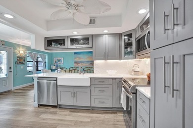 Step within 54 Piedmont B, a quaint coastal retreat, truly set on Kings Point Golf -Flanders Way in Florida - for sale on GolfHomes.com, golf home, golf lot