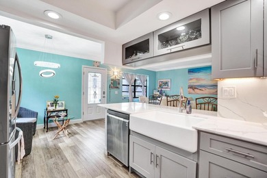 Step within 54 Piedmont B, a quaint coastal retreat, truly set on Kings Point Golf -Flanders Way in Florida - for sale on GolfHomes.com, golf home, golf lot