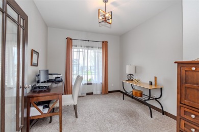 Welcome to this stunning two-story residence nestled in the on The Legacy Golf Club in Iowa - for sale on GolfHomes.com, golf home, golf lot