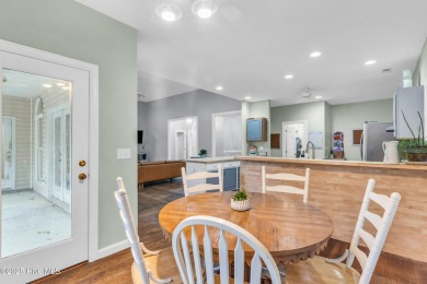 Tucked away on a spacious, pie-shaped lot, this hidden gem on on Olde Point Golf and Country Club in North Carolina - for sale on GolfHomes.com, golf home, golf lot