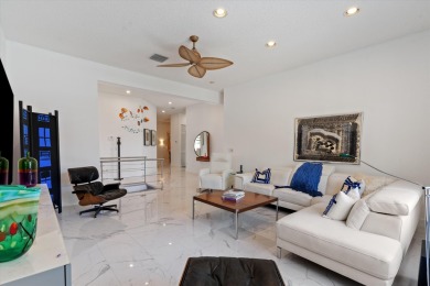 Stunning second-floor condo with breathtaking lake views! This on Boca Delray Golf and Country Club in Florida - for sale on GolfHomes.com, golf home, golf lot