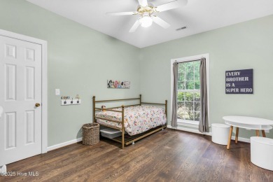 Tucked away on a spacious, pie-shaped lot, this hidden gem on on Olde Point Golf and Country Club in North Carolina - for sale on GolfHomes.com, golf home, golf lot
