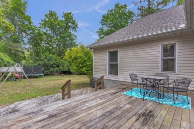 Tucked away on a spacious, pie-shaped lot, this hidden gem on on Olde Point Golf and Country Club in North Carolina - for sale on GolfHomes.com, golf home, golf lot