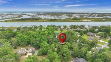 Tucked away on a spacious, pie-shaped lot, this hidden gem on on Olde Point Golf and Country Club in North Carolina - for sale on GolfHomes.com, golf home, golf lot