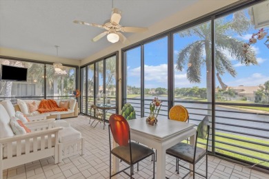 Stunning second-floor condo with breathtaking lake views! This on Boca Delray Golf and Country Club in Florida - for sale on GolfHomes.com, golf home, golf lot